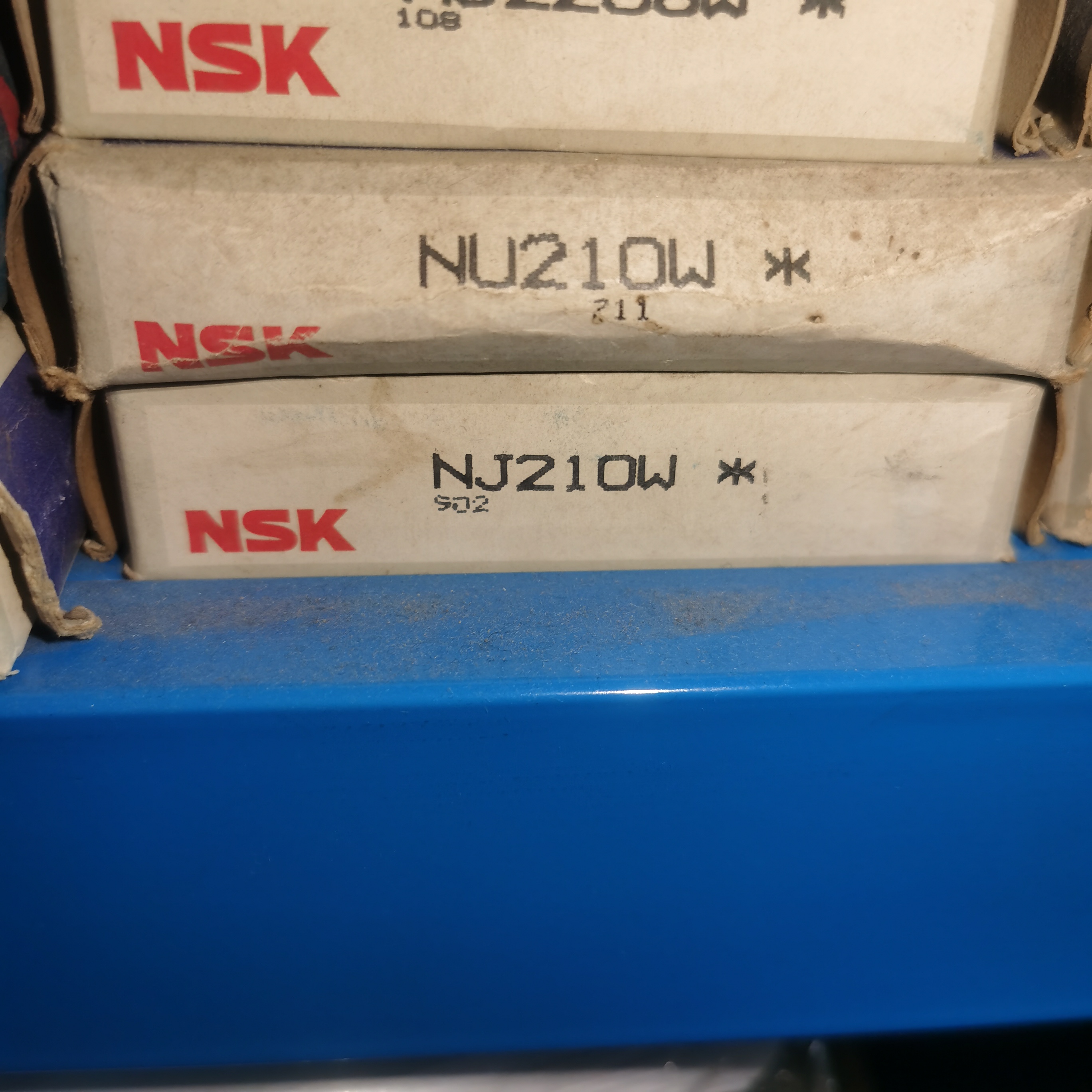 NU210W